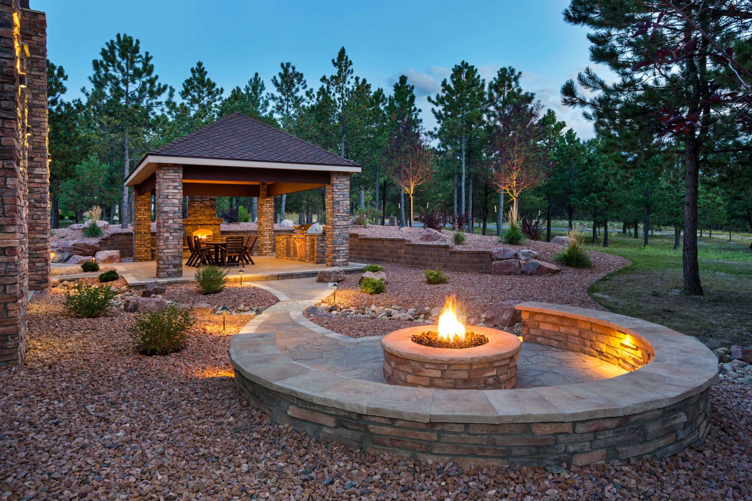 Outdoor stone landscape with wood fire