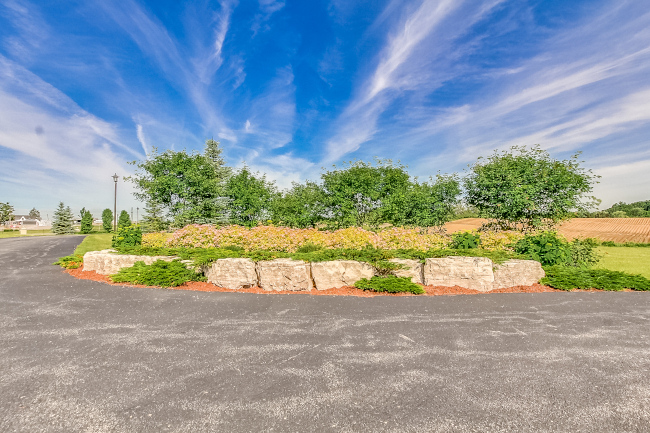 pavement and landscape with blue sky