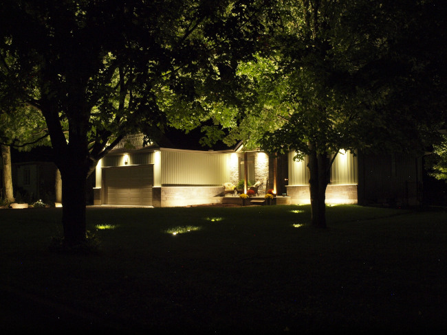 night scene showing a landscape lit up